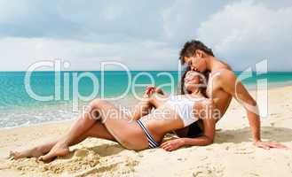 Attractive young couple on the beach
