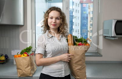 Beautiful woman in kitchen