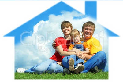 happy family sit on green grass under sky