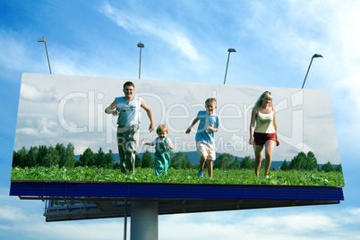 happy family run on grass