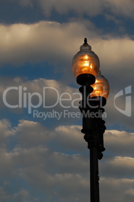 street light with horizontal clouds