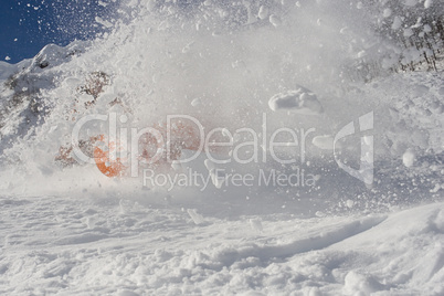 falling snowboarder