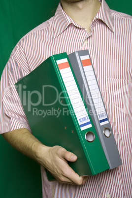 A young businessman with folders