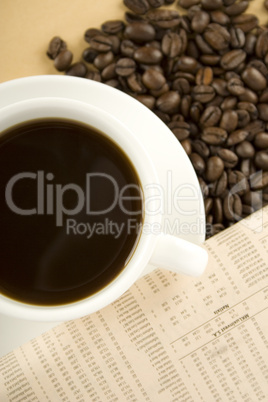 Caffeine Drink & Newspaper