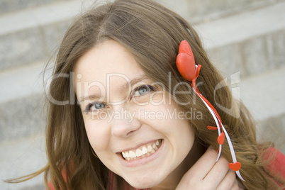 Beautiful girl with a red heart