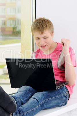 teenager with laptop