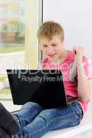 teenager with laptop