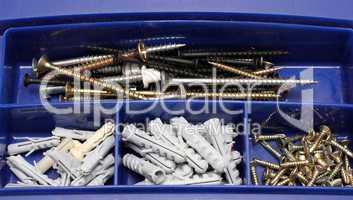 toolbox with screws and dowels
