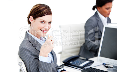 Relaxed businesswoman partners having a break drinking coffee