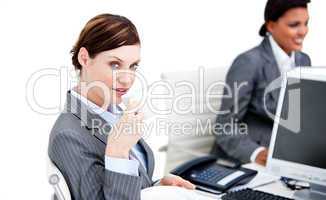 Smiling businesswoman partners having a break drinking coffee