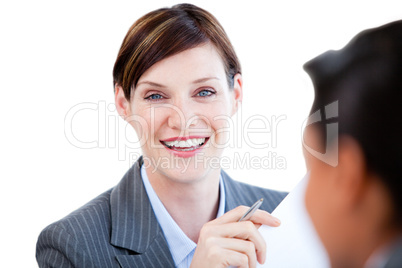 Portrait of a caucasian businesswoman talking with her colleague