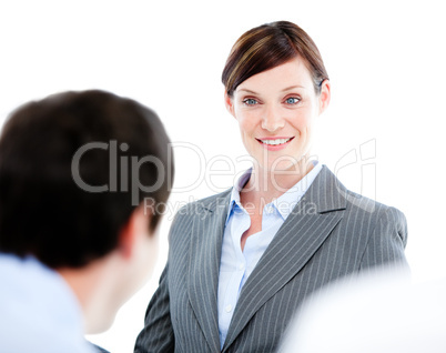 Portrait of a confident businesswoman talking at her colleague d