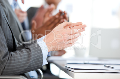 Close-up of a businessteam applauding a presentation