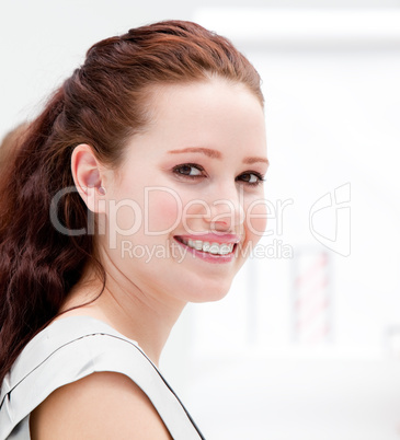 Portrait of a smiling businesswoman  during a meeting