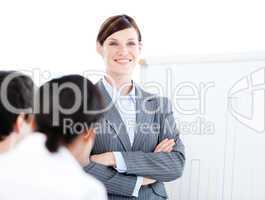 Portrait of a confident businesswoman doing a presentation