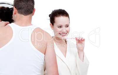 Caucasian couple brushing his teeth