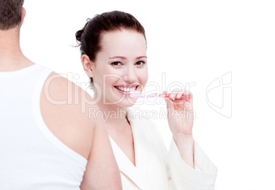 Caucasian couple brushing his teeth