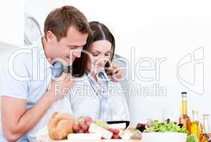 Portrait of Cute couple preparing a meal