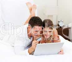 Caucasian couple surfing on the internet