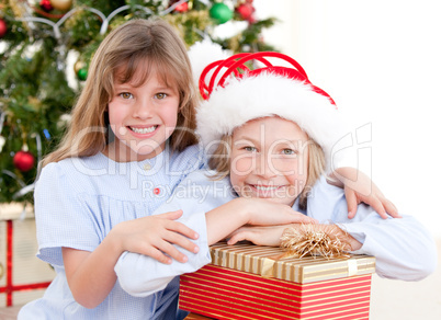 Adorable childrens celebrating christmas