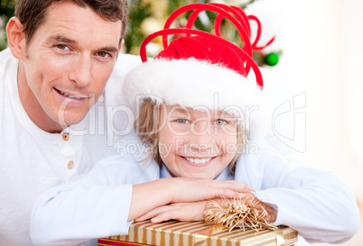 Bright father celebrating christmas with his son