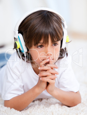 Pensive boy listenning music