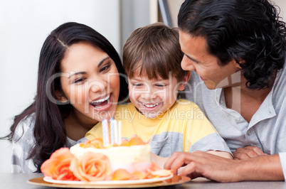 Positive family celebrating a birthday together