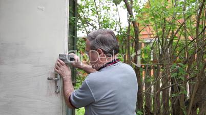 Man repairing lock
