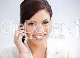 Confident businesswoman talking on phone