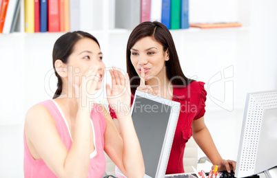 Young businesswoman asking for silence while her colleague shout