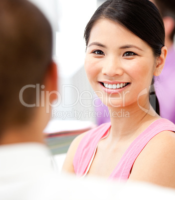 Portrait of an Asian businesswoman in a meeting