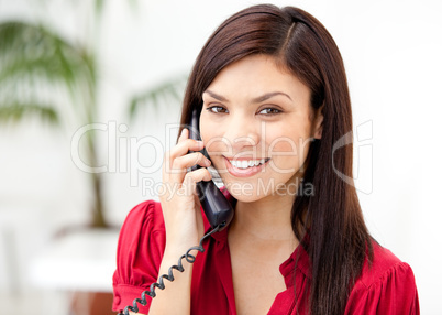 Portrait of a self-assured businesswoman talking on phone