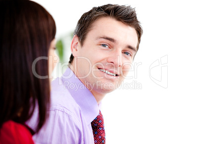 Smiling businessman looking at the camera