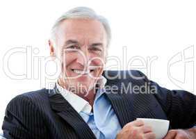 Happy senior businessman drinking a coffee