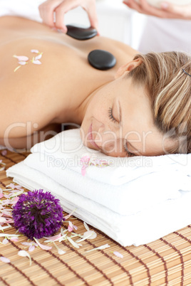 Happy woman having a flower