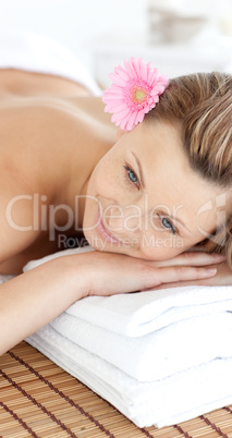 Close-up of a delighted woman having a massage with stones