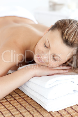 Close-up of a caucasian woman having a massage with stones