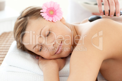 Portrait of a sleeping woman having a flower