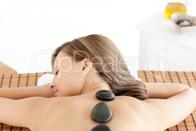 Sleeping woman relaxing on a massage table