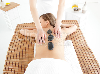 Attractive woman lying on a massage table