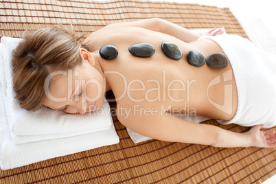 Cute woman lying on a massage table