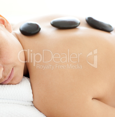 Sleeping woman lying on a massage table