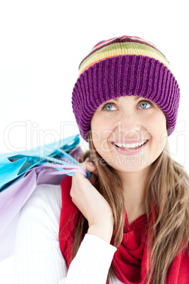 Positive woman holding shopping bags
