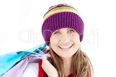 Smiling woman holding shopping bags