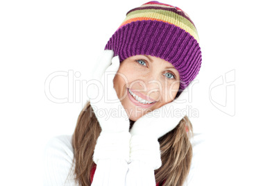 Cheerful woman smiling against
