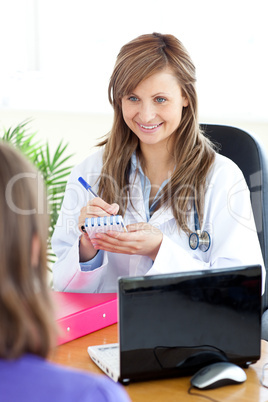 Happy female doctor doing a diagnosis