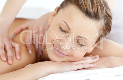 Charming woman enjoying a back massage