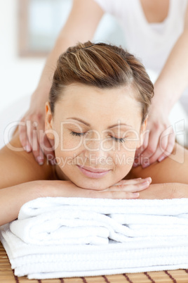 Radiant woman enjoying a back massage