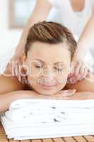 Radiant woman enjoying a back massage