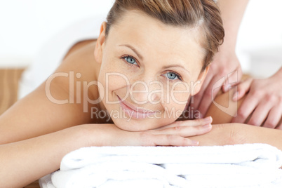 Charming woman enjoying a back massage